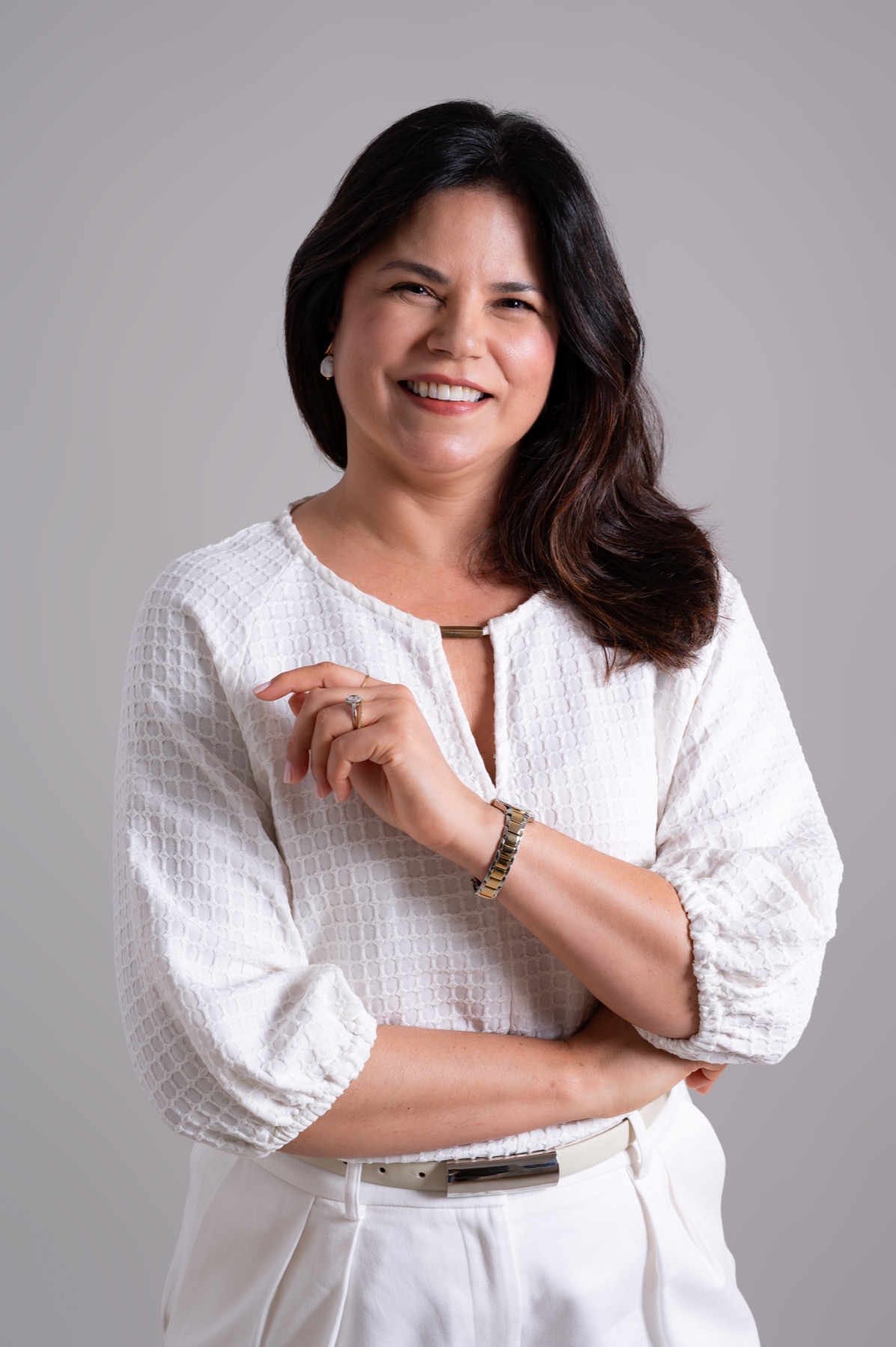 Dra. Andrea Pinhatti em retrato profissional